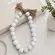 Colar de Mesa Decorativo com Contas Brancas